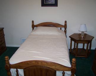 ONE OF THE TWIN CONVERTIBLE BUNK BEDS