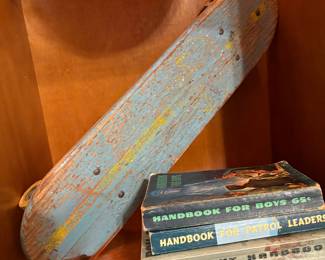 Vintage Skateboard and Boy Scout Manuals
