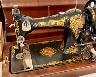 Jones sewing machine with wooden cover