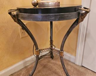 Hollywood Regency Leather Top Metal Table with Brass Ramsheads on sides.