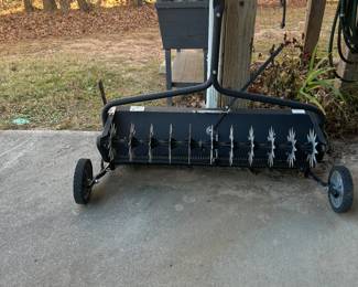 Tow-behind dethatcher