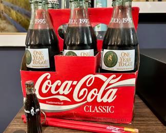 Six-pack of Coca-Cola Classic
“One Year To Go – July 1995