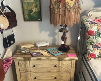 Distressed three drawer nightstand