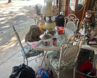 Four vintage iron patio chairs