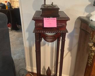 Plant stand with Victrola music box