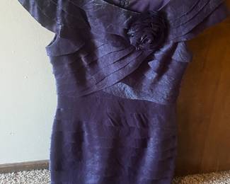 Several high end formal dresses