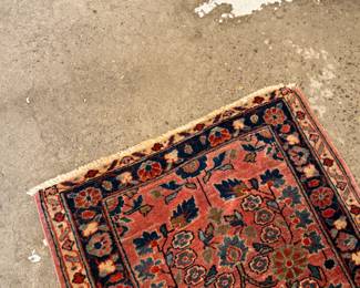 This lot features a Persian Sarouk rug that measures, 32” H x 22.5” W.