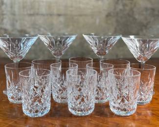 This lot features a wonderful collection of fourteen (14) pieces of Waterford Crystal. All pieces bear the maker mark underneath as shown in photos and appear to be in very good condition.