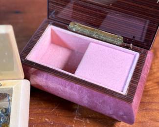 This lot features three (3) music boxes, all manufactured by The San Francisco Music Box Company. All three are in good overall condition with maker mark present underneath as shown in photos.