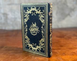 This lot features an antique book by author F. A. Moore titled, "Gems For You: A Gift For All Seasons", published by William H. Fisk circa 1851.