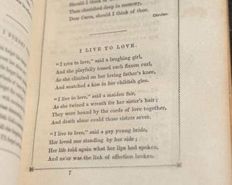 This lot features an antique book by author F. A. Moore titled, "Gems For You: A Gift For All Seasons", published by William H. Fisk circa 1851.