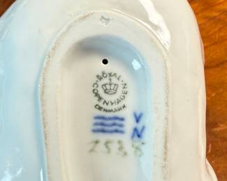 This lot features a large collection of traditional German incense smokers, also known as Räuchermännchen. Also, a decorative glass Christmas bottle and a porcelain bear manufactured by Royal Copenhagen. Maker mark present underneath as shown in photos.