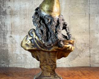 This lot features a large bronze bust depicting Marianne of France. Hollow inside as shown in photos, but quite heavy and well-made. This sculpture measures, 26” H x 16” W x 8” D.