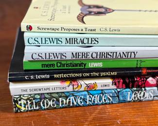 This lot features a collection of seven (7) vintage books by author, C. S. Lewis.