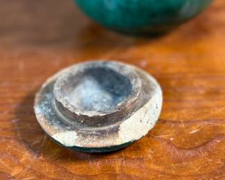This lot features an antique Chinese green-glazed pottery ginger jar. Originally used for storing spices and herbs, the tradition of ginger jars dates back to China’s Qin dynasty. This jar measures, 4.5” H x 5.5” W x 5.5” D.