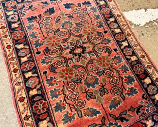 This lot features a Persian Sarouk rug that measures, 32” H x 22.5” W.