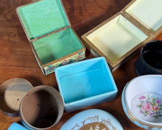 This lot features a large collection of antique jewelry and trinket boxes made from various materials by makers around the world.