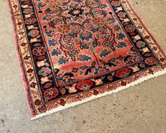 This lot features a Persian Sarouk rug that measures, 32” H x 22.5” W.
