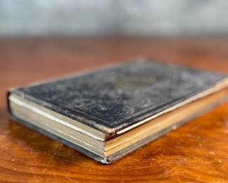 This lot features an antique hardcover book of, "The Lily of the Valley", edited by Elizabeth Doten circa 1854.