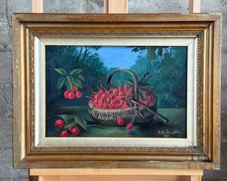 "Still Life With Cherries", an original oil on board and signed by artist, E.W. Troughton, circa 1907. This piece measures in frame, 19.25” H x 25.5” W.