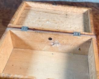 This lot features a pair of 19th century wooden boxes in good overall condition given their age. The largest measures, 5.25” H x 10.75” W x 5.75” D.