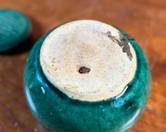 This lot features an antique Chinese green-glazed pottery ginger jar. Originally used for storing spices and herbs, the tradition of ginger jars dates back to China’s Qin dynasty. This jar measures, 4.5” H x 5.5” W x 5.5” D.