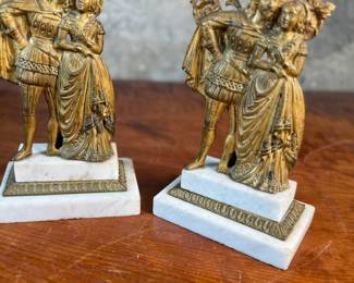 This lot features a pair of high quality Victorian polished brass candelabras with prisms and marble bases. Each one measures, 15.5” H x 5.5” W x 3.5” D.