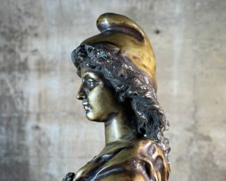 This lot features a large bronze bust depicting Marianne of France. Hollow inside as shown in photos, but quite heavy and well-made. This sculpture measures, 26” H x 16” W x 8” D.