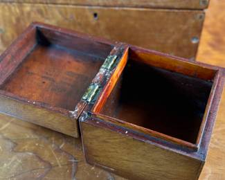 This lot features a pair of 19th century wooden boxes in good overall condition given their age. The largest measures, 5.25” H x 10.75” W x 5.75” D.