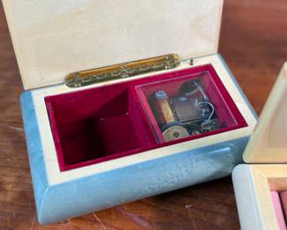 This lot features three (3) music boxes, all manufactured by The San Francisco Music Box Company. All three are in good overall condition with maker mark present underneath as shown in photos.