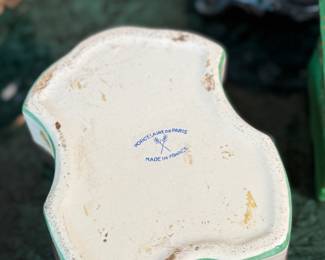 This lot features a large collection of antique trinket boxes that are primarily porcelain. Many of them contain maker marks and are held on a vintage green tray that is included.