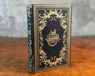 This lot features an antique book by author F. A. Moore titled, "Gems For You: A Gift For All Seasons", published by William H. Fisk circa 1851.