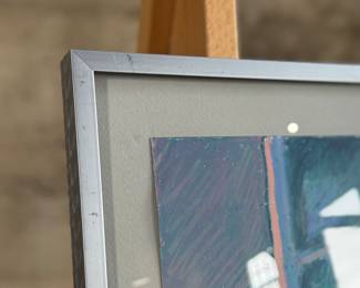 This lot features an original mixed media painting, housed in silver metal frame and depicts a sunlit walkway with geometric shadows. Signed lower left and measures in frame, 21” H x 27” W.