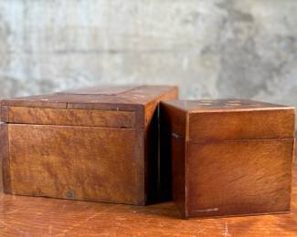 This lot features a pair of 19th century wooden boxes in good overall condition given their age. The largest measures, 5.25” H x 10.75” W x 5.75” D.