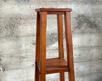 This lot features a modern three-tier shelving unit that measures, 60” H x 15” W x 15” D.