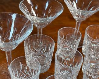 This lot features a wonderful collection of fourteen (14) pieces of Waterford Crystal. All pieces bear the maker mark underneath as shown in photos and appear to be in very good condition.