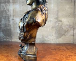 This lot features a large bronze bust depicting Marianne of France. Hollow inside as shown in photos, but quite heavy and well-made. This sculpture measures, 26” H x 16” W x 8” D.