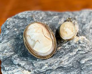 This lot features a pair of antique gold cameos. One is marked 12K gold-fill and the smaller one does not have any visible markings. Total approx. weight for both cameos is 7.00 grams.