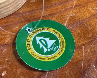 This lot features a large collection of traditional German incense smokers, also known as Räuchermännchen. Also, a decorative glass Christmas bottle and a porcelain bear manufactured by Royal Copenhagen. Maker mark present underneath as shown in photos.