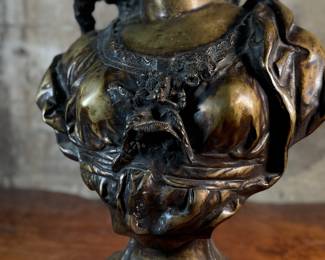 This lot features a large bronze bust depicting Marianne of France. Hollow inside as shown in photos, but quite heavy and well-made. This sculpture measures, 26” H x 16” W x 8” D.