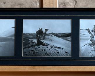“Arab Desert Scenes”, three professionally framed silver gelatin prints by listed photographers, Rudolf Franz Lehnert & Ernst Heinrich Landrock. Measures in frame, 10” H x 30” W. Rudolf Franz Lehnert (1878-1948) and Ernst Heinrich Landrock (1880-1957), a renowned photographic team of the early 20th century, known for their Orientalist images, often featuring desert scenes with camels and local inhabitants, distributed as original prints, photogravures, and postcards.