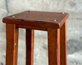 This lot features a modern three-tier shelving unit that measures, 60” H x 15” W x 15” D.