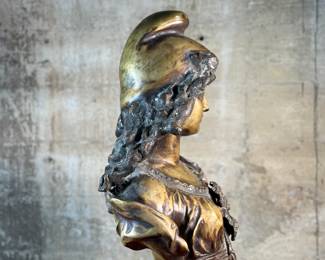 This lot features a large bronze bust depicting Marianne of France. Hollow inside as shown in photos, but quite heavy and well-made. This sculpture measures, 26” H x 16” W x 8” D.
