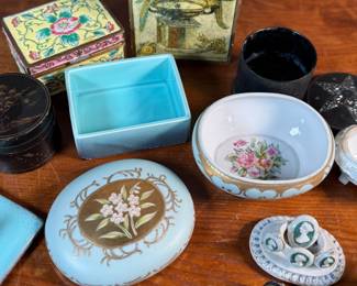 This lot features a large collection of antique jewelry and trinket boxes made from various materials by makers around the world.
