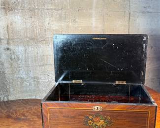 This lot features a large 19th century wooden box that measures, 8” H x 18” W x 11” D.