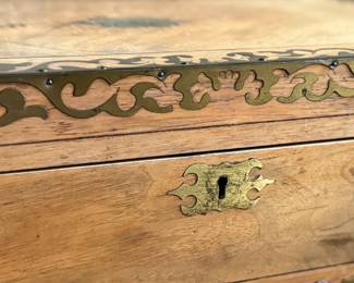 This lot features an incredible 19th century Italian travel desk on a wooden stand. The travel desk is removable and features numerous drawers and compartments inside. This piece measures (on the stand), 26” H x 20” W x 11” D.