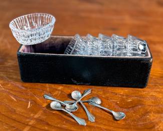 This lot features an antique set of six (6) salt cellars, accompanied by six (6) sterling silver spoons with a total approx. weight of 10.22 grams.