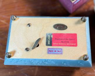 This lot features three (3) music boxes, all manufactured by The San Francisco Music Box Company. All three are in good overall condition with maker mark present underneath as shown in photos.