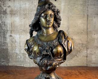 This lot features a large bronze bust depicting Marianne of France. Hollow inside as shown in photos, but quite heavy and well-made. This sculpture measures, 26” H x 16” W x 8” D.