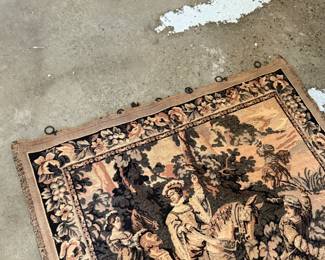 This lot features a French Aubusson-style wall tapestry, likely a handwoven replica of a 17th-century historical tapestry. This piece measures, 48” H x 48” W.